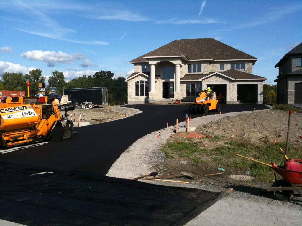 What Maintenance Is Required After Paving My Driveway to Ensure Its Longevity?